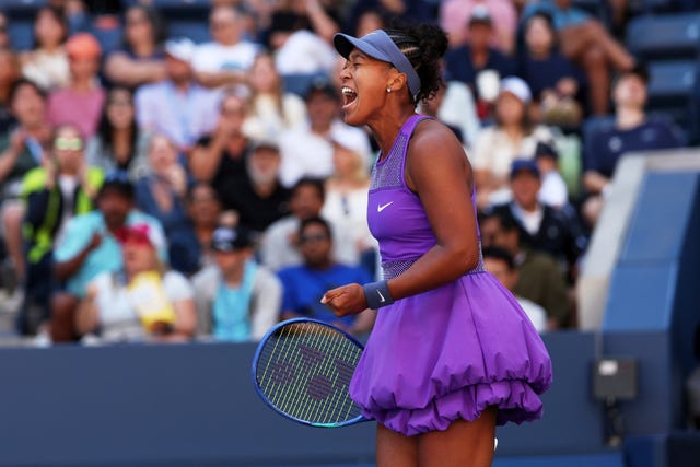 Naomi Osaka reacts to winning a point against Daria Kasatkina
