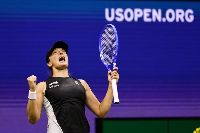 Iga Swiatek celebrates beating Anna Kalinskaya 