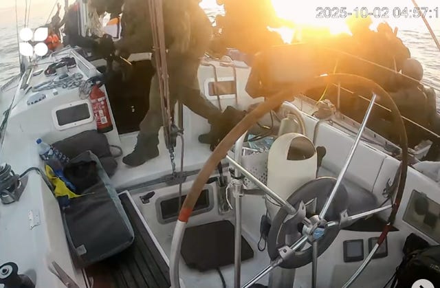 Israeli navy soldiers board one of the flotilla vessels 