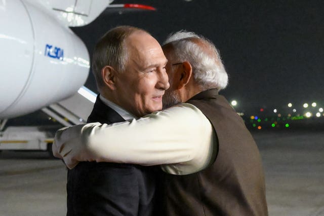 Narendra Modi gives Vladimir Putin a big cuddle