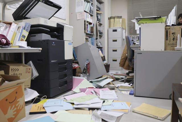 Papers are scattered on the floor of an office in Hakodate, Hokkaido, northern Japan 