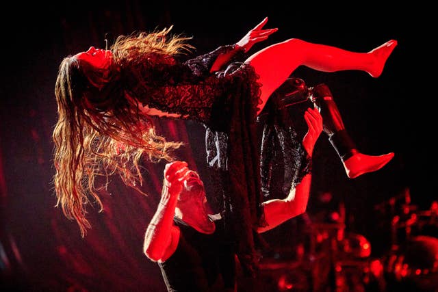 Volunteer soldier Rusya Danilkina, 21, who lost her leg in the Russia-Ukraine war, and choreographer Pavlo Semakin perform during the shooting of the Christmas TV show Dancing With The Stars in Kyiv, Ukraine