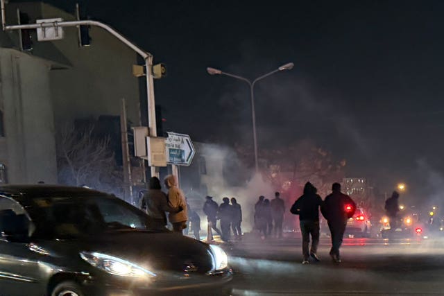 Tear gas being fired during an anti-government protest in Tehran, Iran