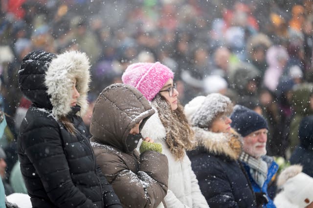 People gather in Crans-Montana during the national day of mourning