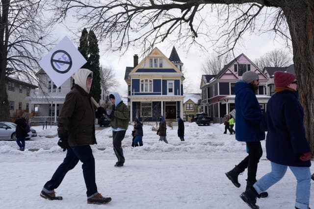 Protesters gather during a rally for Renee Good,