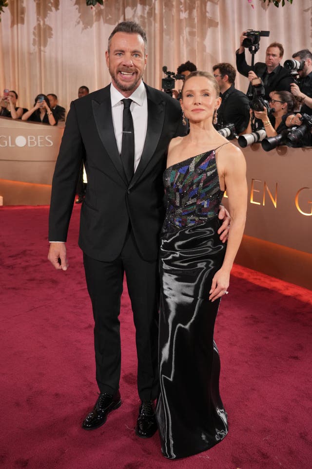 Dax Shepard, left, and Kristen Bell arrive at the 83rd Golden Globes on Sunday, Jan. 11, 2026, at the Beverly Hilton in Beverly Hills, Calif. (Photo by Jordan Strauss/Invision/AP)