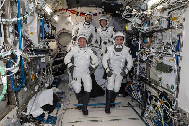 Mike Fincke, Oleg Platonov, Zena Cardman and Kimiya Yui inside the International Space Station