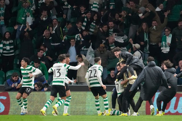 Sporting’s team celebrate after Luis Suarez scored his side’s second goal 