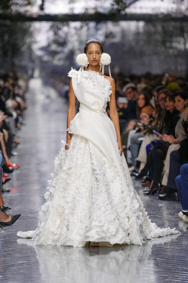 A model wears a creation as part of the Christian Dior Spring/Summer 2026 Haute Couture show