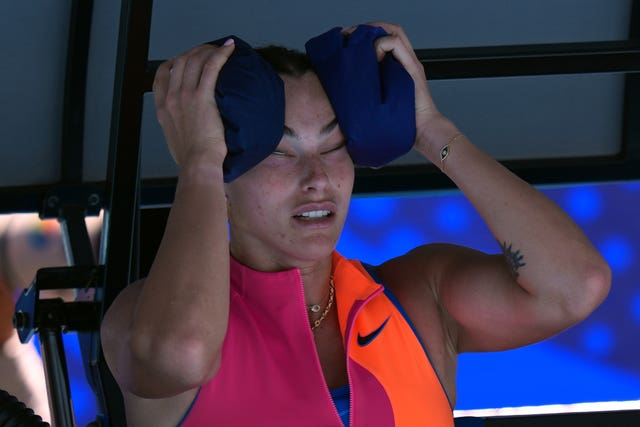 Aryna Sabalenka puts ice packs on her head 