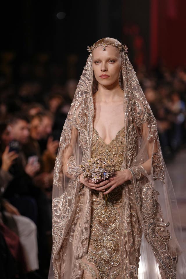 A model wears a creation as part of the Elie Saab Spring/Summer 2026 Haute Couture collection presented in Paris
