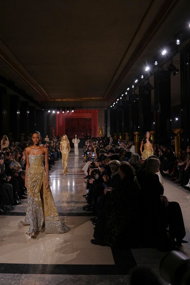 Models wear creations as part of the Elie Saab Spring/Summer 2026 Haute Couture collection presented in Paris