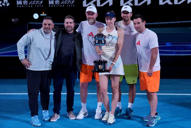 Elena Rybakina with her team, including coach Stefano Vukov, second right 