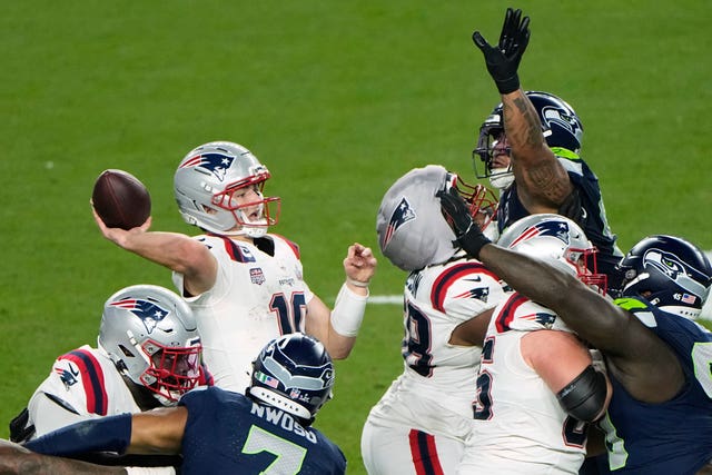 New England Patriots quarterback Drake Maye throws under pressure