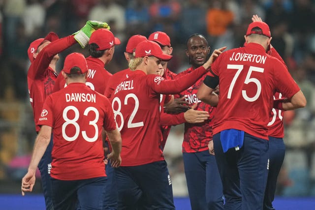 Jofra Archer celebrates with England team-mates after the early wicket of Shai Hope