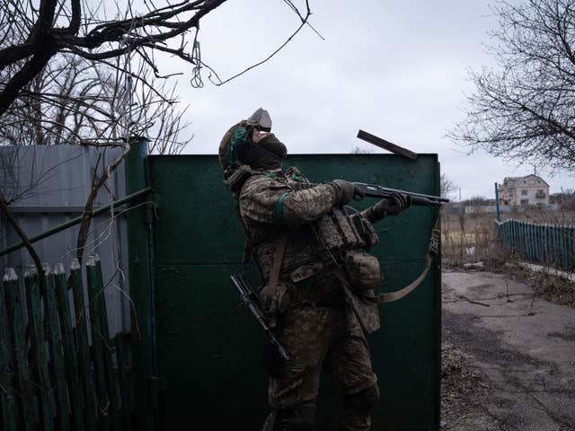 In this photo provided by Ukraine’s 93rd Kholodnyi Yar Separate Mechanized Brigade press service, a soldier watches for Russian FPV drones on the front line near Kostyantynivka, Donetsk region, Ukraine