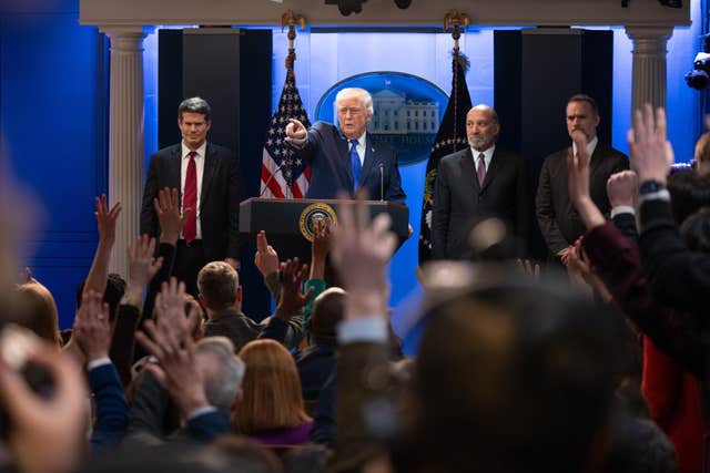 US President Donald Trump answers questions during a press briefing