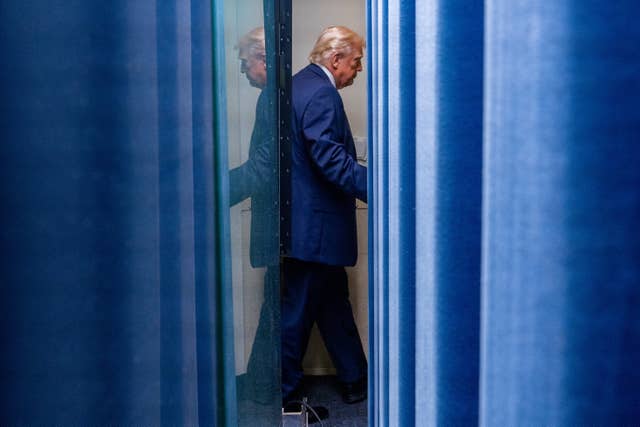 President Donald Trump departs after speaking with reporters in the James Brady Press Briefing Room at the White House
