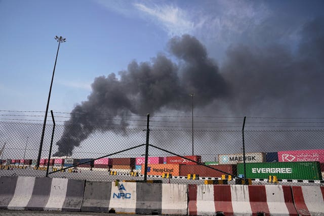 Smoke rises after an Iranian drone attack in the port area of Dubai