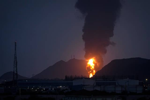 Large fire and plume of smoke is visible after, according to the authorities, debris of an Iranian intercepted drone hit the Fujairah oil facility, in Fujairah, United Arab Emirates