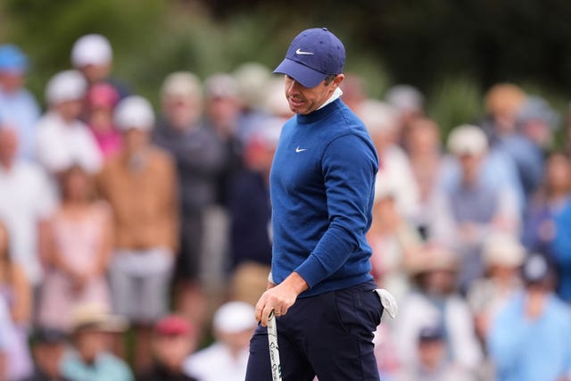 Rory McIlroy of Northern Ireland reacts to his putt on the 11th