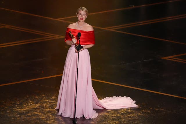 Jessie Buckley accepting the award for actress in a leading role