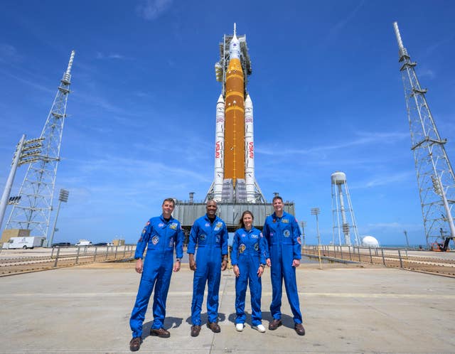 The crew with outside the rocket before lift-off