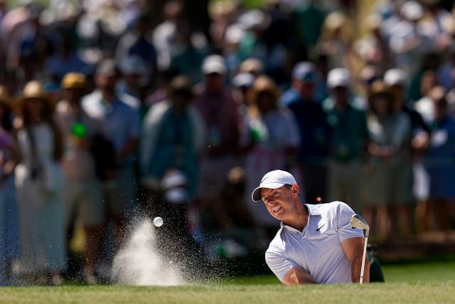 Rory McIlroy hits out of a bunker
