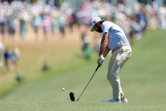 Cameron Young hits from the fairway