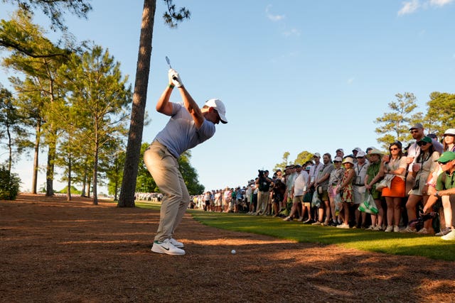 Rory McIlroy plays a shot from the pine straw