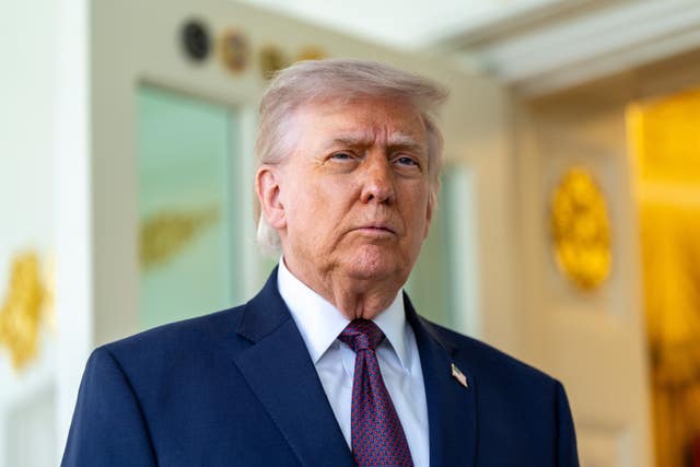 President Donald Trump speaks with reporters outside the Oval Office of the White House in Washington