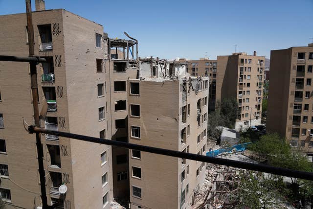 A residential building is damaged, after being hit by a strike on March 4 during the U.S.-Israeli military campaign, according to Iranian authorities, in southeastern Tehran, Iran