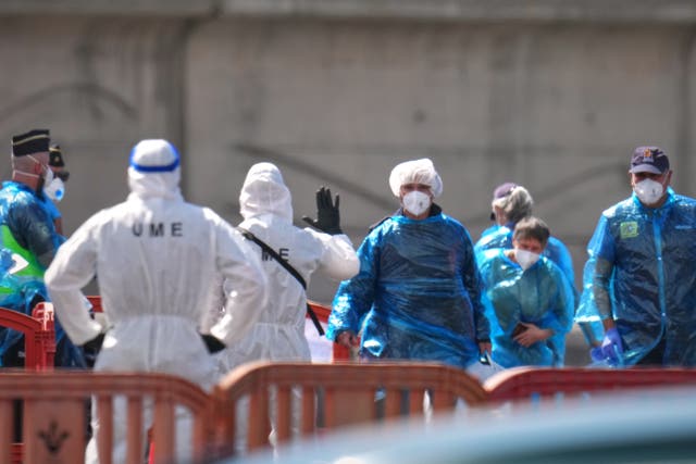 Passengers are disembarked from the MV Hondius at the port of Granadilla in Tenerife 