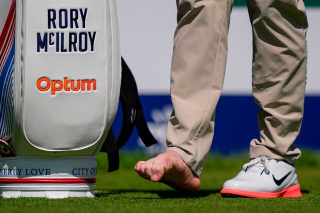 McIlroy with shoe off