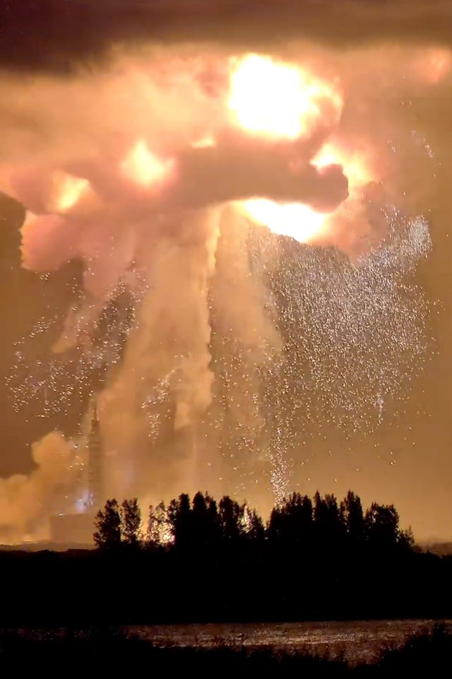 A Blue Origin New Glenn rocket explodes during an engine-firing test  at Cape Canaveral, Florida 