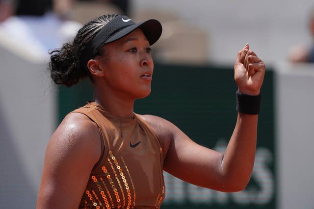 Naomi Osaka clenches her fist