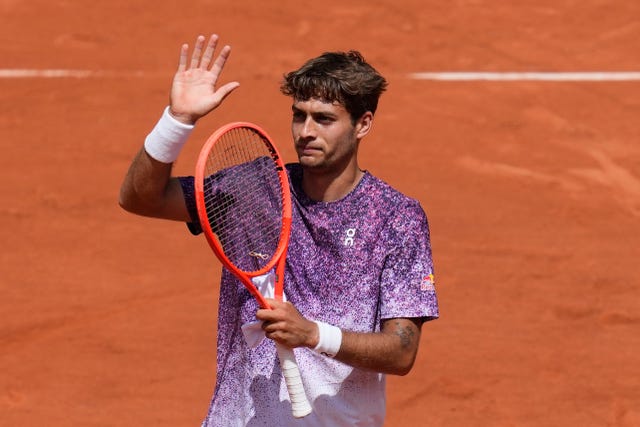 Italy’s Flavio Cobolli reacts after winning in the fourth round at the French Open