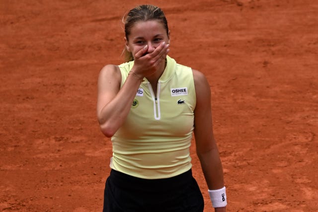 Maja Chwalinska reacts in disbelief after beating Anna Kalinskaya