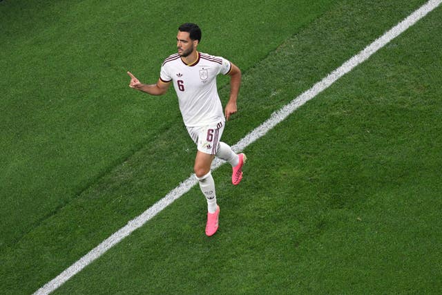 Mikel Merino celebrates after scoring Spain's winner against Portugal 