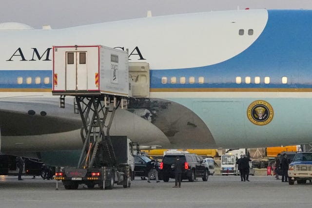 A catering truck is parked at Air Force One 