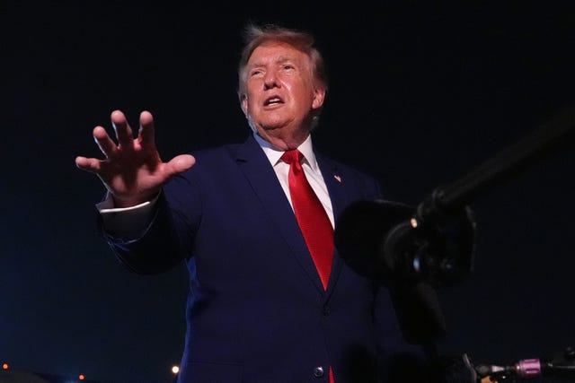 President Donald Trump talks to reporters after arriving on Air Force One at Joint Base Andrews, Maryland on Tuesday 