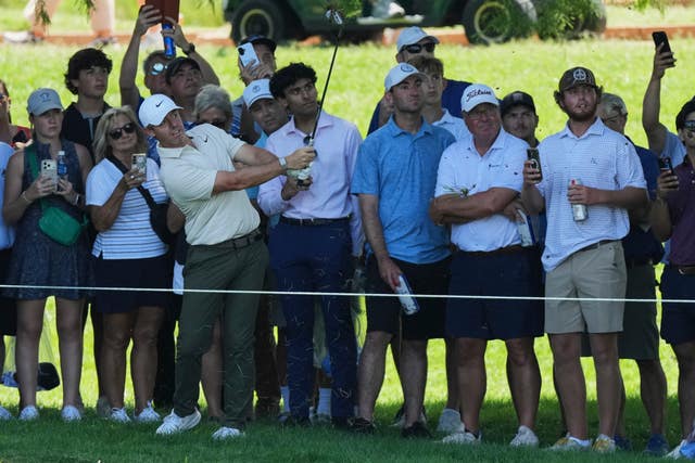 Rory McIlroy hits from the rough on the seventh hole during the first round of the 2026 BMW Championship in St. Louis
