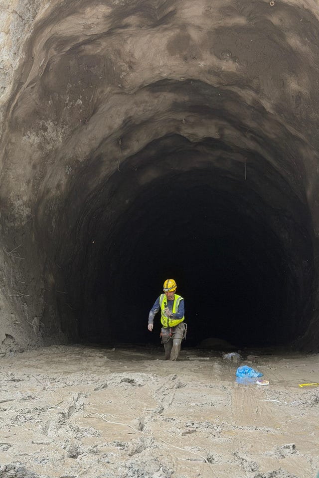 A Nepal army rescuer comes out from the hydropower project in Upper Trishuli 