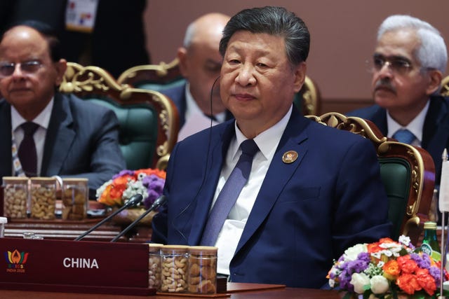 Xi Jinping seated