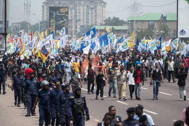 Police and protesters in Kinshasa
