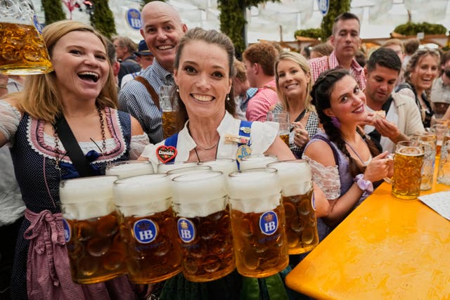 Waitresses with beer mugs