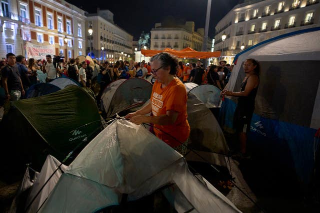 Tents amid a crowd of people