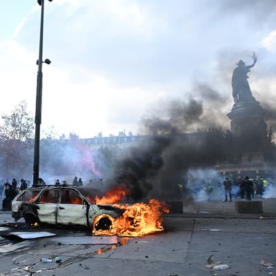 Clashes and fires break out as protesters rally across France
