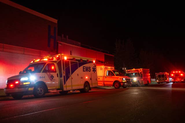 Emergency crews and military personnel gather at the Wainwright Health Centre 