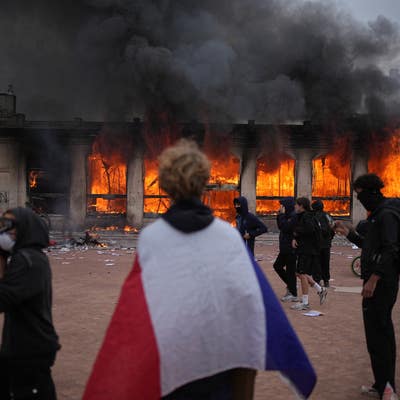 Clashes, fires and looting break out as protesters rally across France
